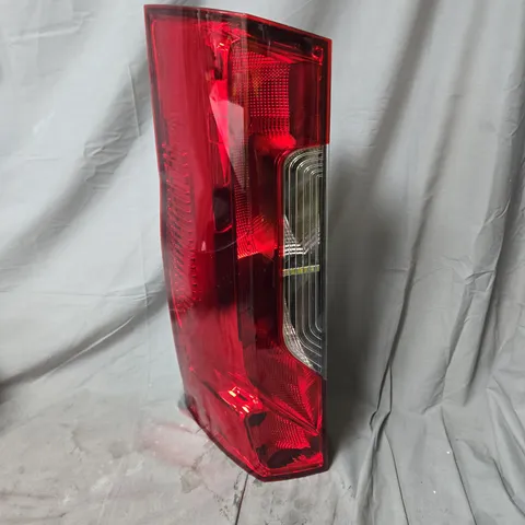 AUTOMOTIVE TAIL LIGHT ASSEMBLY – RED LENS WITH CLEAR INDICATOR - MODEL UNSPECIFIED