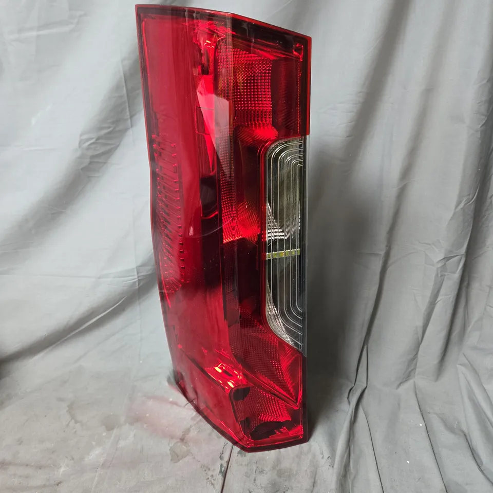 AUTOMOTIVE TAIL LIGHT ASSEMBLY – RED LENS WITH CLEAR INDICATOR - MODEL UNSPECIFIED