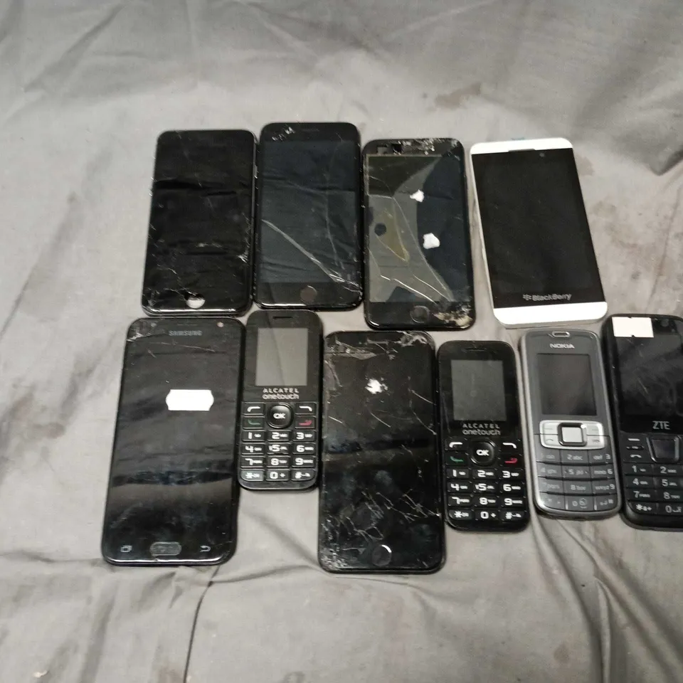 APPROXIMATELY 30 ASSORTED USED PHONES AND PHONE PARTS TO INCLUDE BLACKBERRY, NOKIA, APPLE IPHONE, ETC