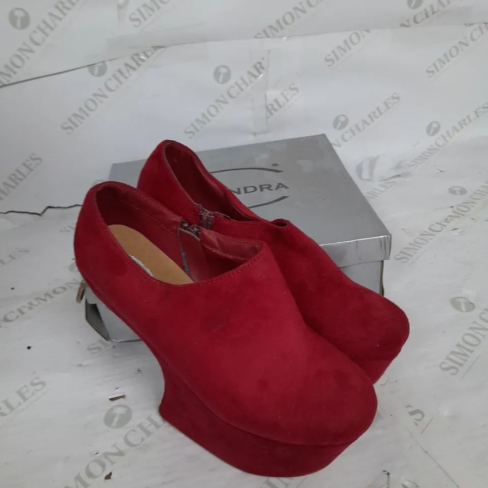 BOXED PAIR OF CASSANDRA PLATFORM SHOE IN RED SUEDE WITH GOLD SPIKES SIZE 6