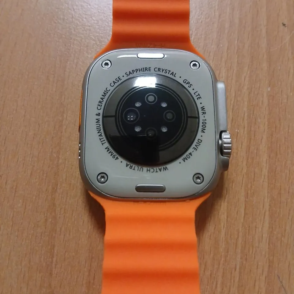 SMARTWATCH WITH ORANGE SILICONE STRAP – TITANIUM & CERAMIC CASE, SAPPHIRE CRYSTAL (GPS + LTE)