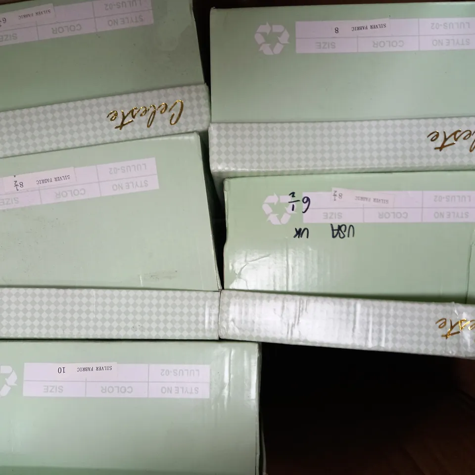 APPROXIMATELY 10 BOXED PAIR OF CELESTE HIGH HEEL SHOES IN SILVER FABRIC TO INCLUDE SIZES 6.5, 8.5, 10