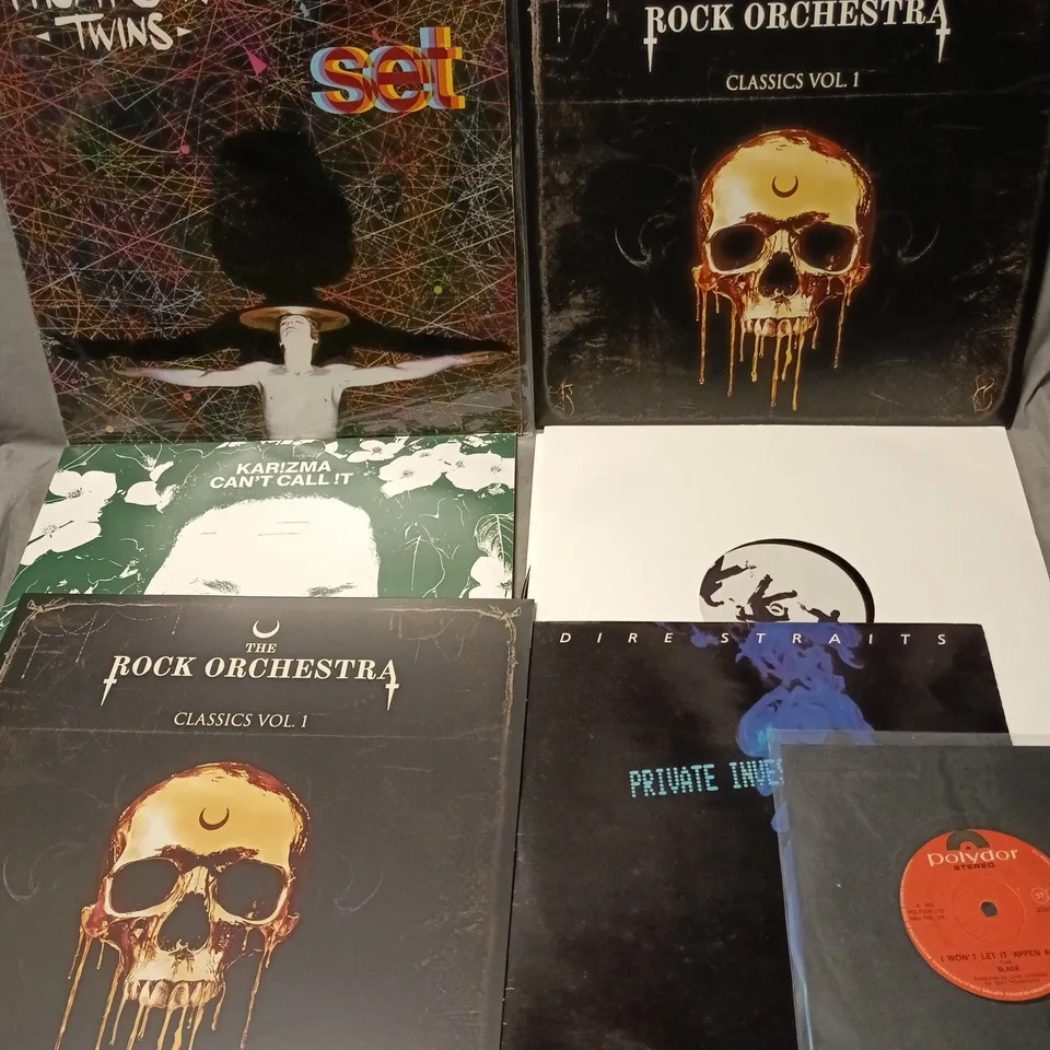 APPROXIMATELY 12 ASSORTED VINYLS TO INCLUDE ARTISTS SUCH AS THIN LIZZY, ELTON JOHN, DIRE STRAITS, ETC - COLLECTION ONLY