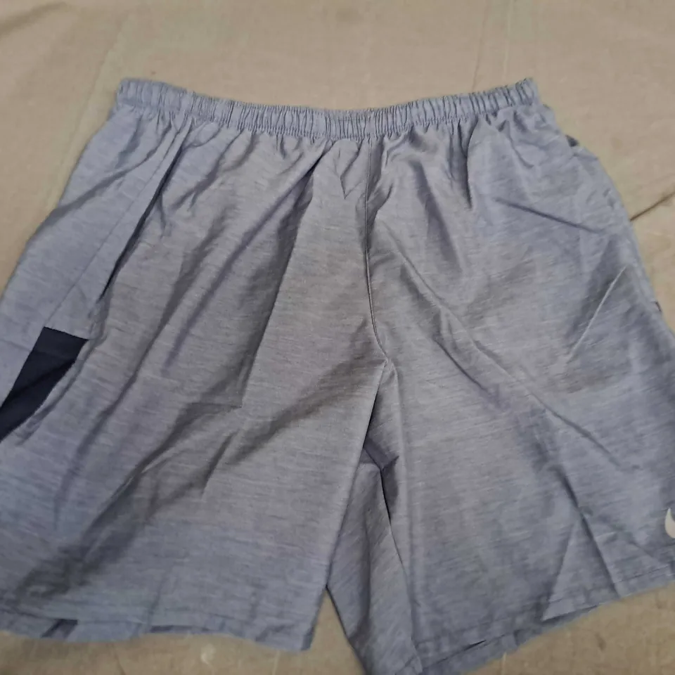 NIKE STANDARD FIT 7" FIT SHORTS IN BLUE - MEDIUM