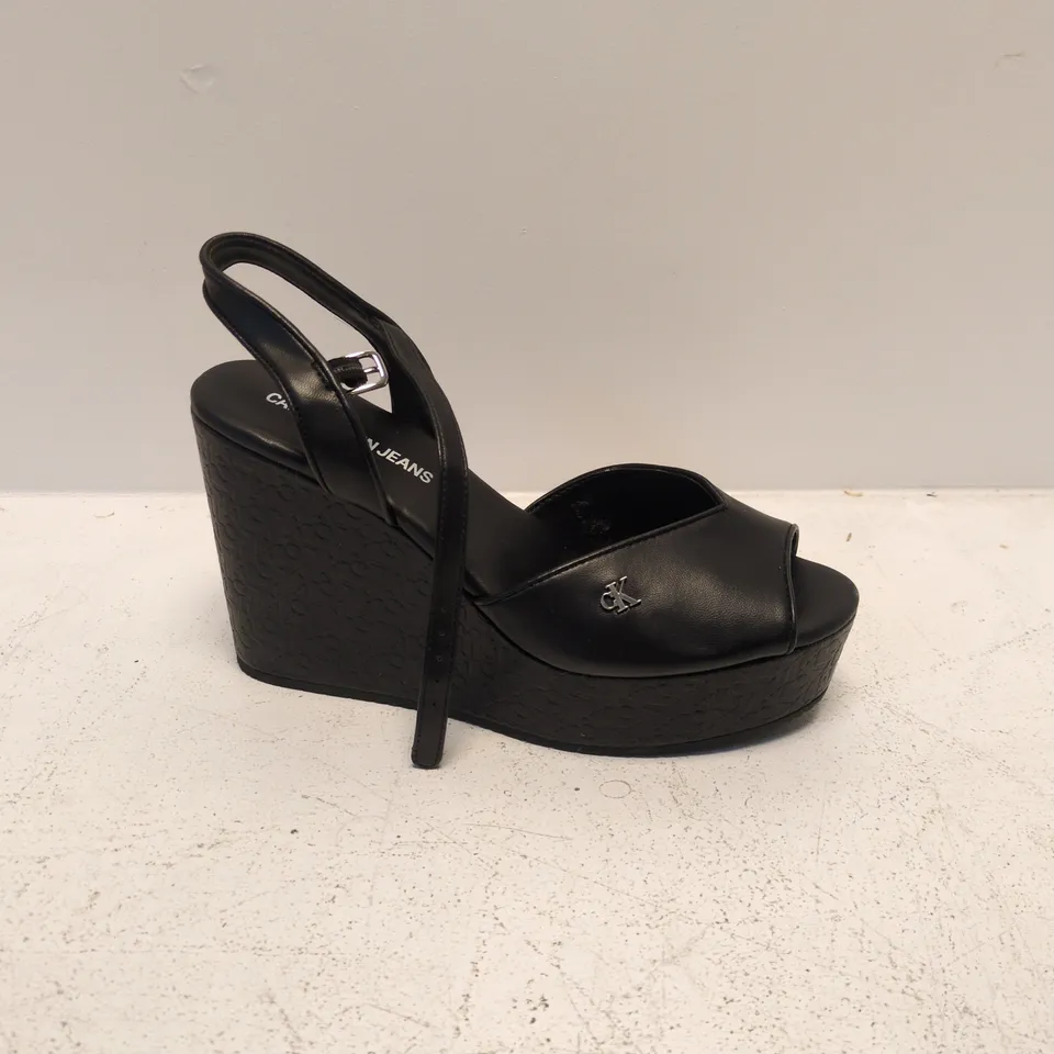 CALVIN KLEIN JEANS BLACK WEDGE SANDALS – ANKLE STRAP