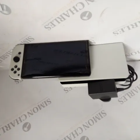 NINTENDO SWITCH AND CHARGING STATION