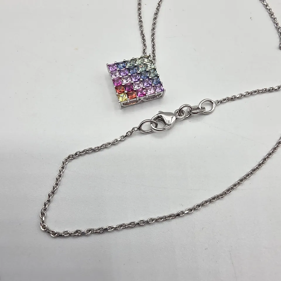 18CT WHITE GOLD PENDANT ON CHAIN SET WITH NATURAL RAINBOW SAPPHIRES WEIGHING +-1.30CT