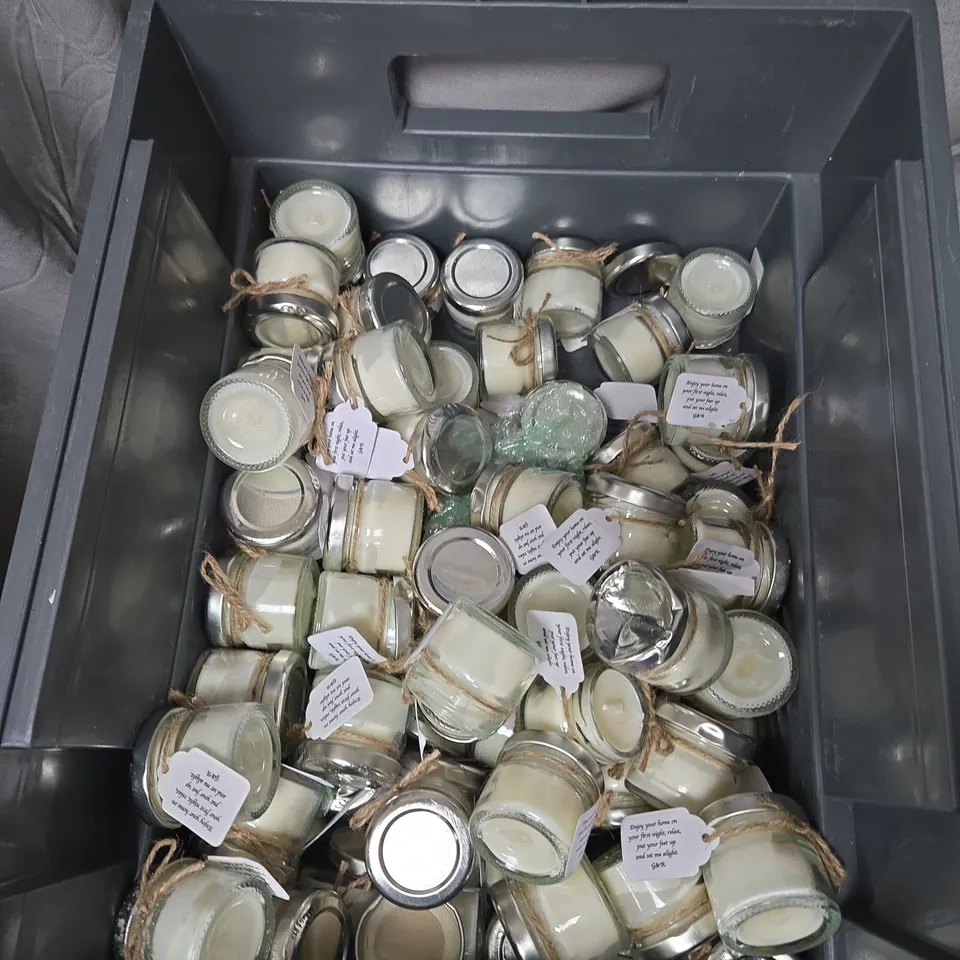 APPROXIMATELY 30 SMALL GLASS JAR CANDLES.