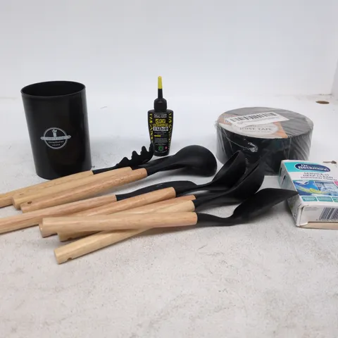 TOTE OF APPROXIMATELY 20 ASSORTED ITEMS TO INCLUDE KITCHEN UTENSILS AND POT, JOIST TAPE, DR BECKMANN DISHWASHER CLEANER ETC