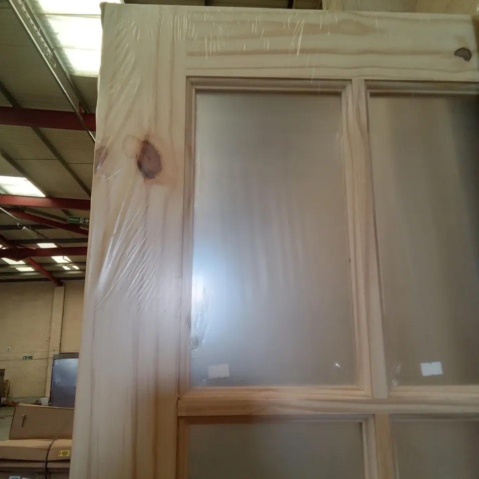 PACKAGED 1981 X 762MM GLAZED KNOTTY PINE INTERNAL DOOR 