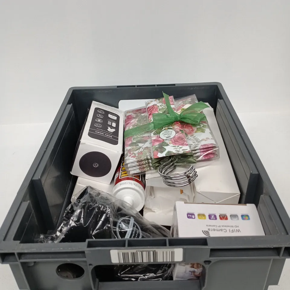 TOTE OF APPROXIMATELY 15 ASSORTED ITEMS TO INCLUDE HARD AS NAILS ADHESIVE, WIFI CAMERA, FLEXIFILL REFILLABLE BOTTLE, ROSE FRAGRANCE PACKS ETC