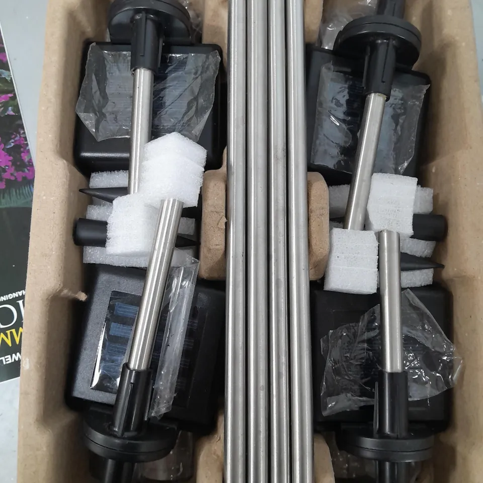 BOXED BELL & HOWELL GLIMMER STICKS SET OF 4 SOLAR PATHWAY LIGHTS