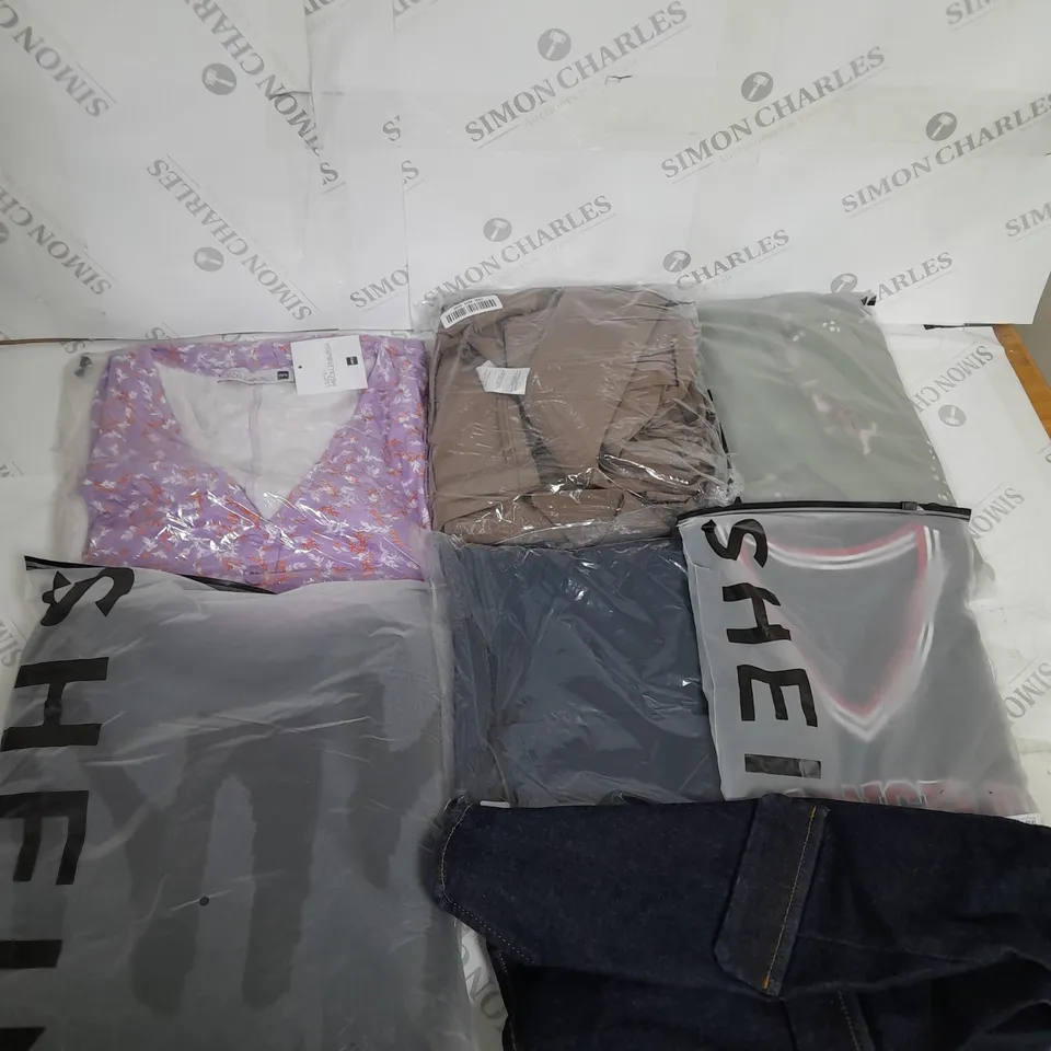 LARGE BOX OF ASSORTED CLOTHING ITEMS IN VARIOUS COLOURS AND SIZES INCLUDING TROUSERS , TOPS AND JUMPERS 