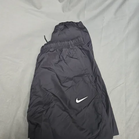 NIKE LOGO NYLON TRACKSUIT BOTTOMS SIZE M