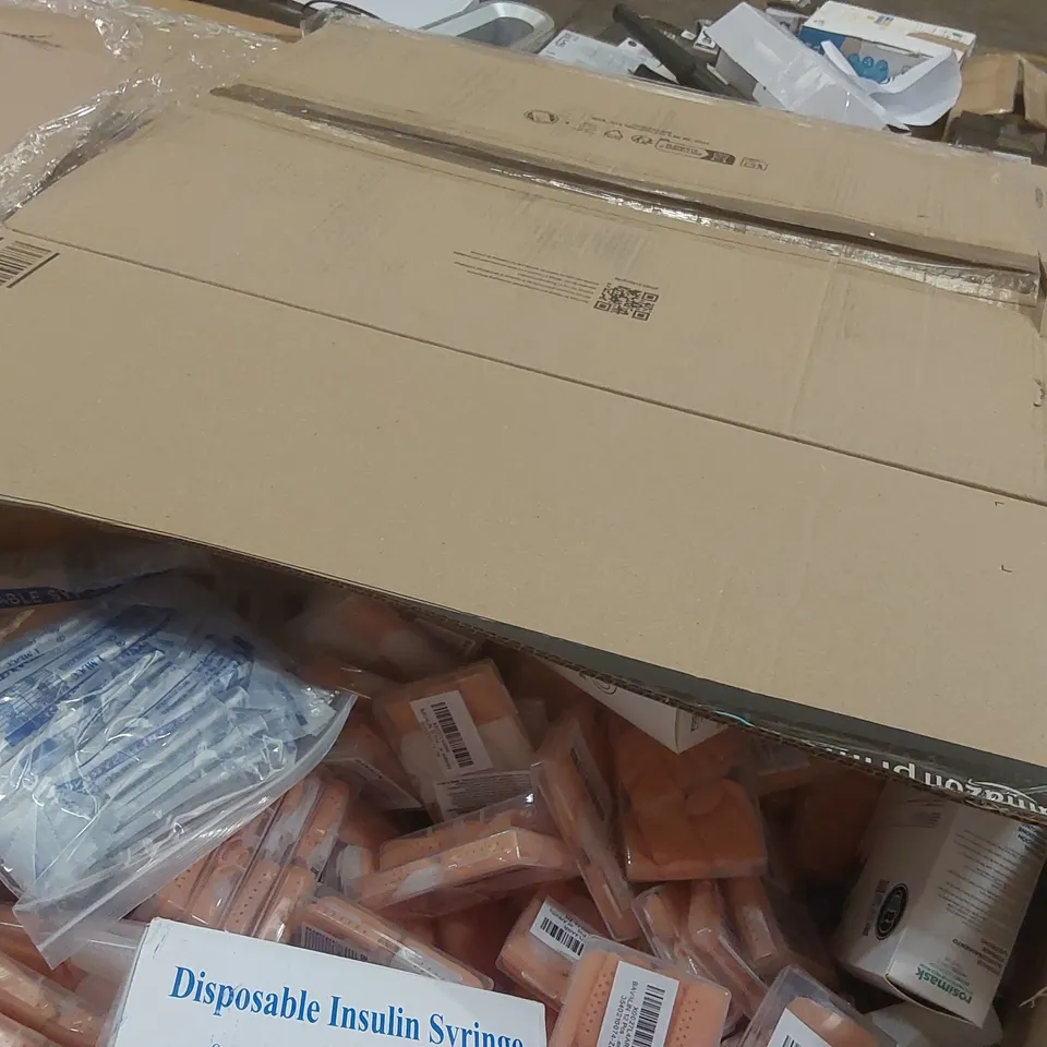 PALLET CONTAINING A VERY LARGE QUANTITY OF ASSORTED MEDICAL SUPPLIES INCLUDING: FINGER SLEEVES, LIPID TEST STRIPS, INSULIN SYRINGES, FACE MASKS ECT