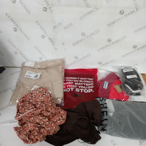 LARGE BOX OF ASSORTED CLOTHING ITEMS IN VARIOUS COLOURS AND SIZES INCLUDING TROUSERS , TOPS AND JUMPERS 
