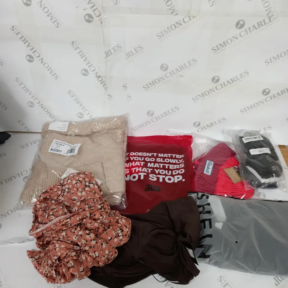 LARGE BOX OF ASSORTED CLOTHING ITEMS IN VARIOUS COLOURS AND SIZES INCLUDING TROUSERS , TOPS AND JUMPERS 