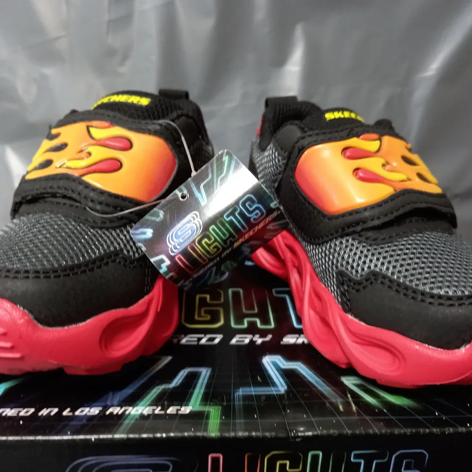 BOXED PAIR OF SKECHERS LIGHTS VELCRO TRAINERS IN BLACK/RED - KIDS UK 5
