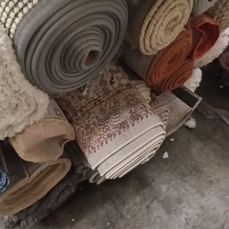 STILLAGE OF QUALITY DESIGNER AREA RUGS APPROXIMATELY 22 RUGS 