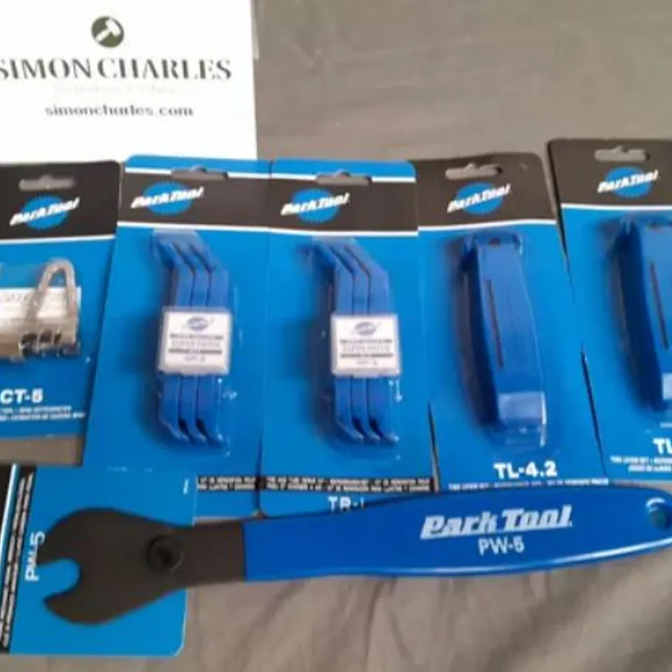 LOT OF 6 ASSORTED PARKTOOL ITEMS INCLUDES MINI CHAIN TOOL, PEDAL WRENCH AND TIRE LEVERS