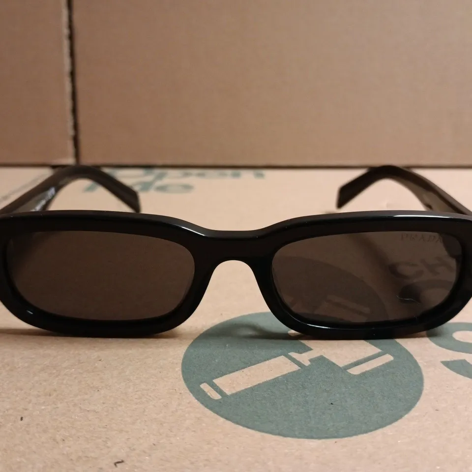 BOXED PAIR OF PRADA SUNGLASSES