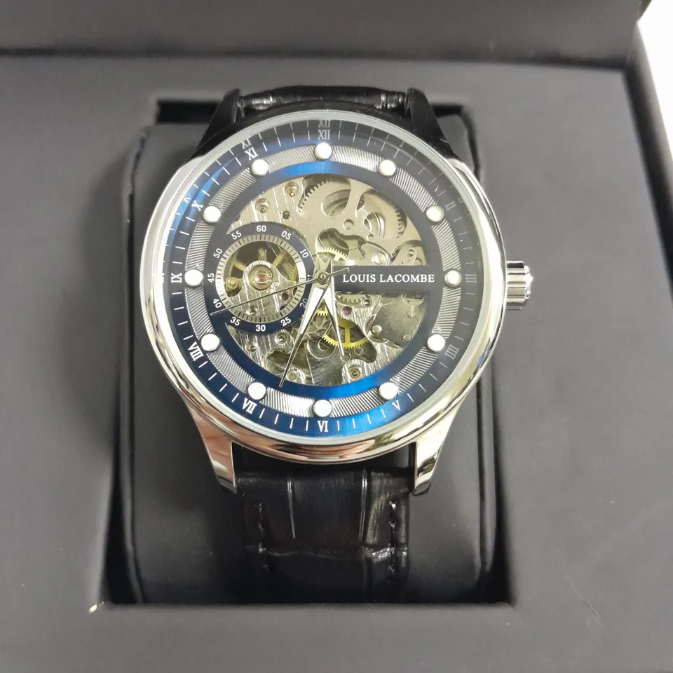 LOUIS LACOMBE BLUE SKELETON DIAL WATCH WITH STAINLESS STEEL CASE AND BLACK LEATHER STRAP IN GIFT BOX