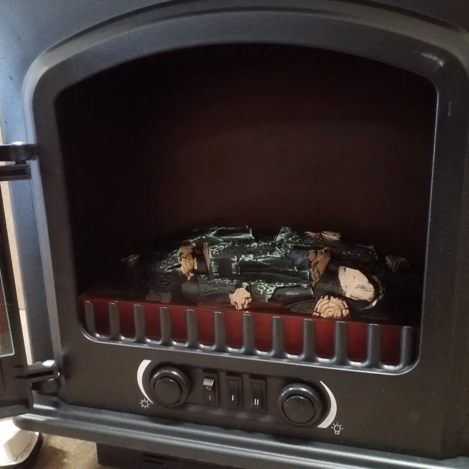 BOXED COLMAN ELECTRIC STOVE 1.8KW MATT BLACK LOG BED