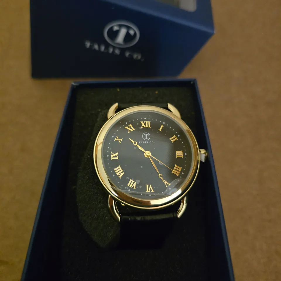 TALIS CO. GOLD-TONE WRISTWATCH WITH ROMAN NUMERALS – BOXED