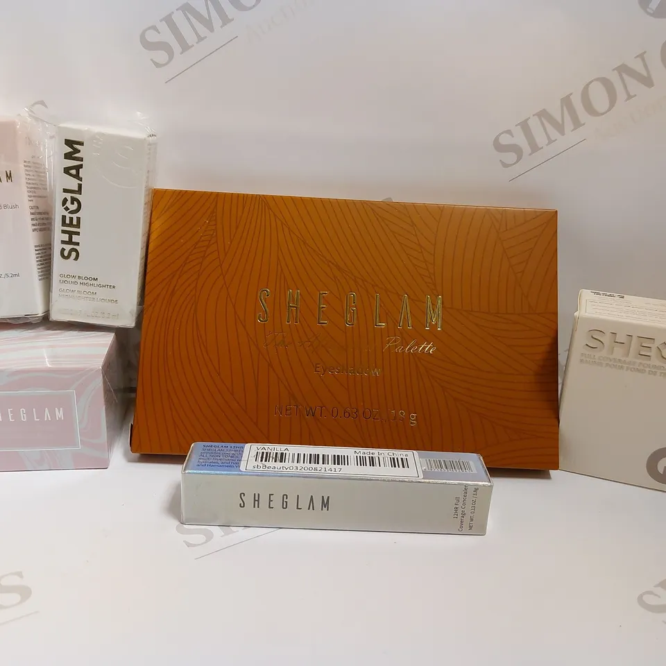 BOX OF APPROX 6 SHEGLAM ITEMS TO INCLUDE EYESHADOW PALETTE, FOUNDATION BALM, LIQUID HIGHLIGHTER