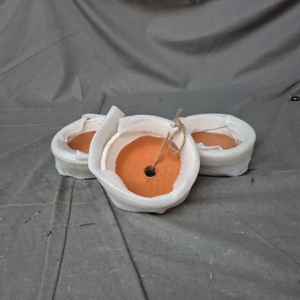 SET OF 3 TERRACOTTA PLANT POTS WITH PROTECTIVE WRAP