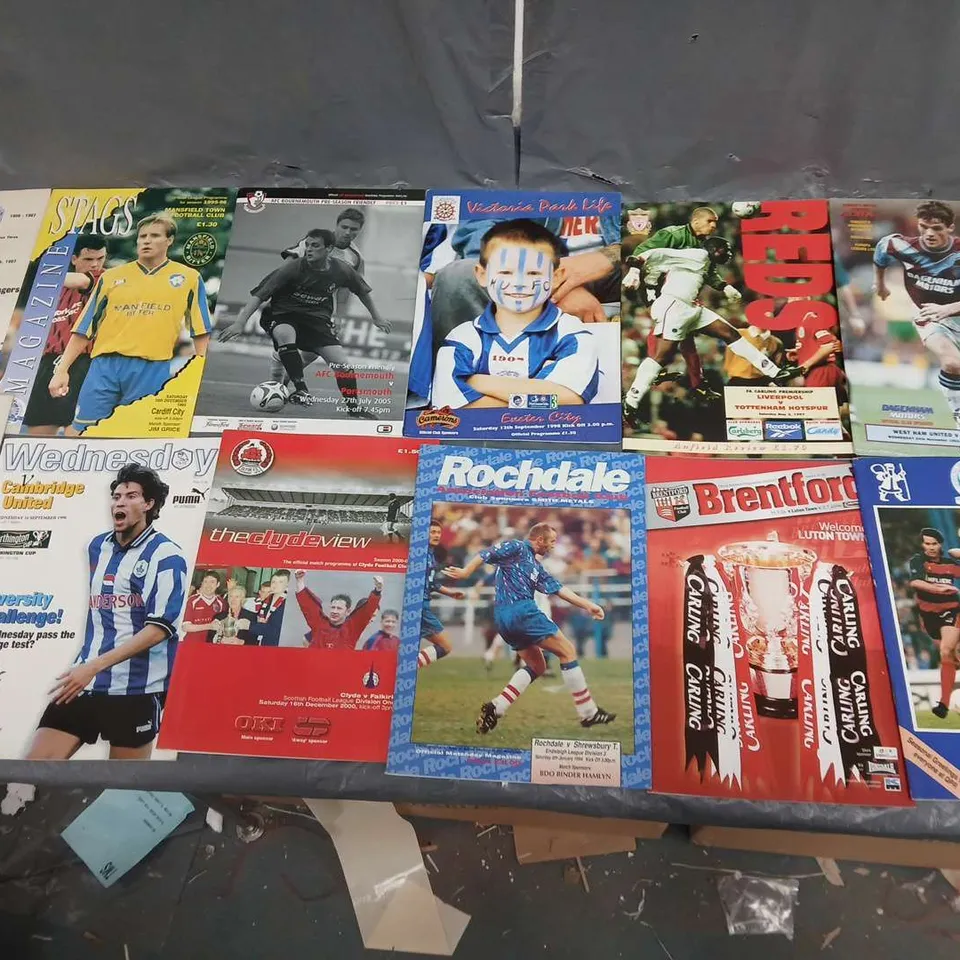 APPROXIMATELY 19 ASSORTED RETRO FOOTBALL PROGRAMMES FROM CLUBS SUCH AS; WEST HAM, LIVERPOOL, ROCHDALE, MANCHESTER UNITED, QPR AND PETERBOROUGH