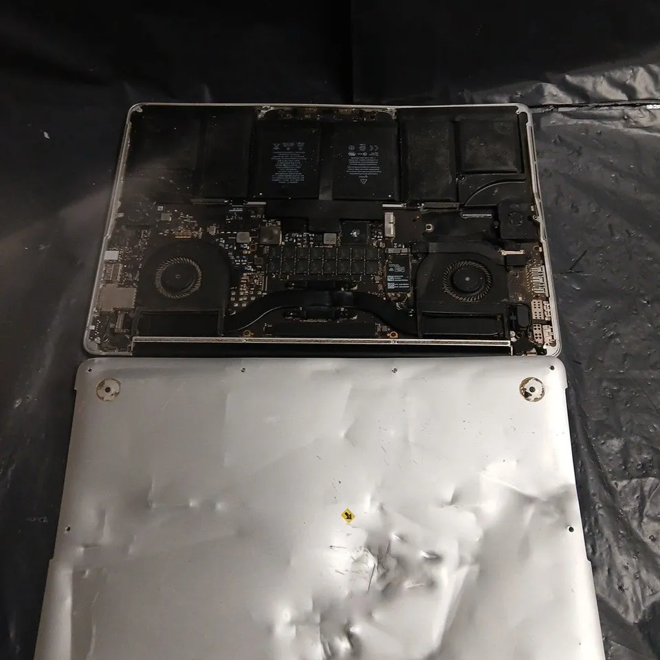 APPLE MACBOOK PRO LAPTOP MODEL A1398 – DAMAGED LCD SCREEN AND DENTED CHASSIS