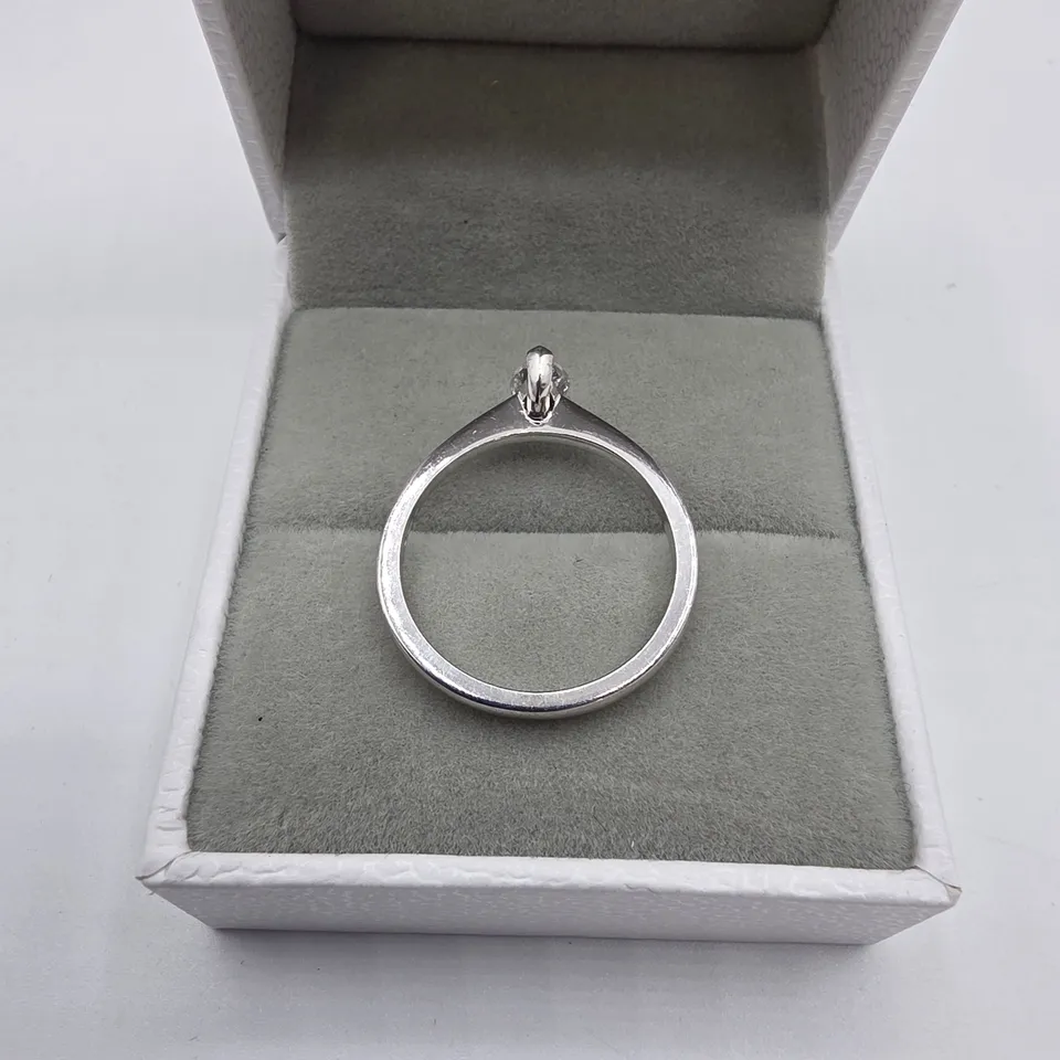 18CT WHITE GOLD SOLITAIRE RING SET WITH A MARQUISE CUT NATURAL DIAMOND