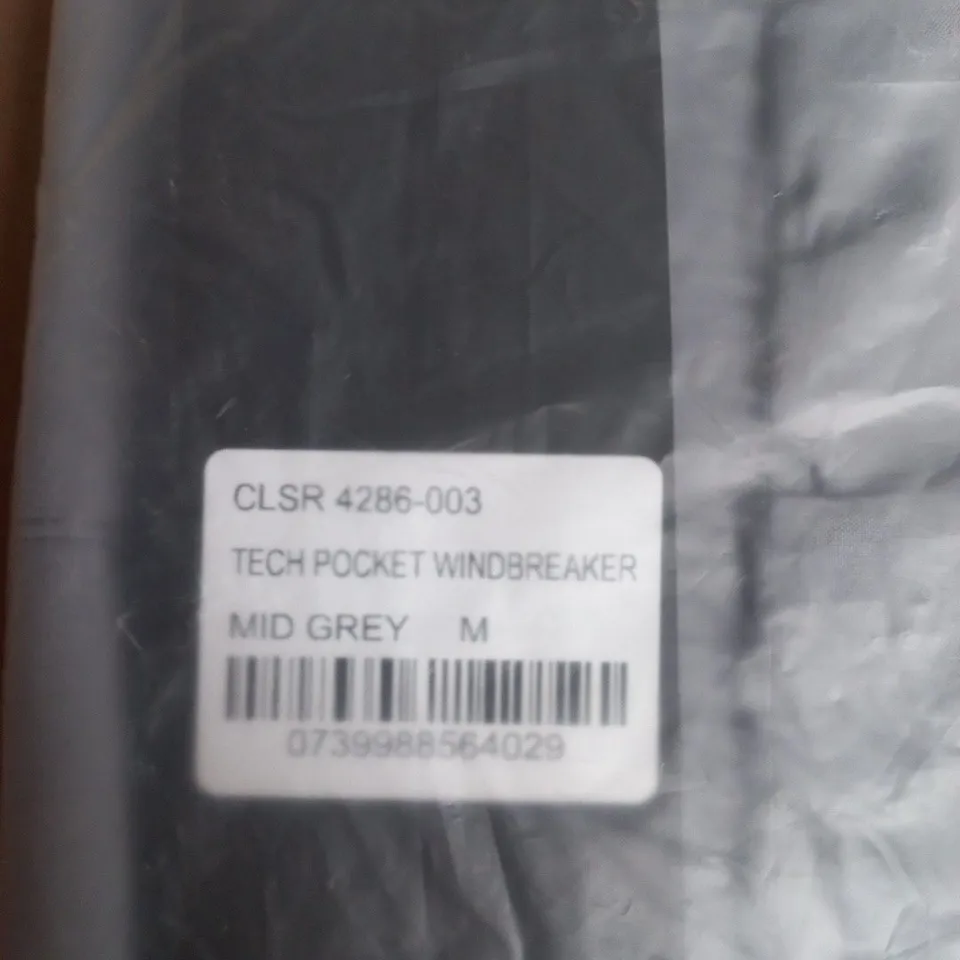 CLOSURE LDN TECH POCKET WINDBREAKER – MID GREY – SIZE M
