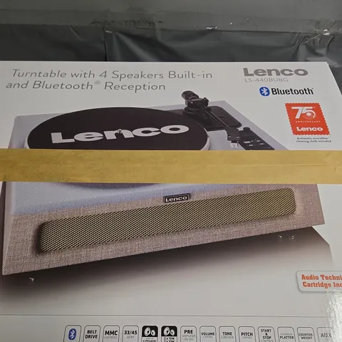 BOXED TURNTABLE WITH 4 SPEAKERS BUILT-IN AND BLUETOOTH RECEPTION.