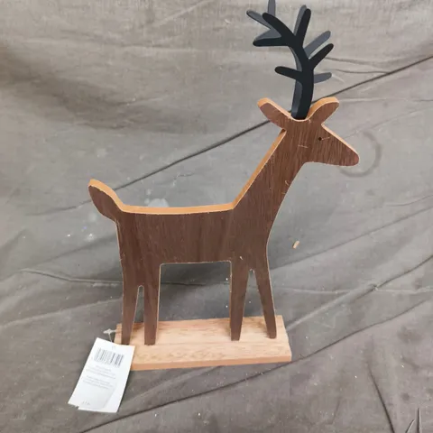 APPROXIMATELY 32 GISELA GRAHAM WOODEN DEER ORNAMENTS