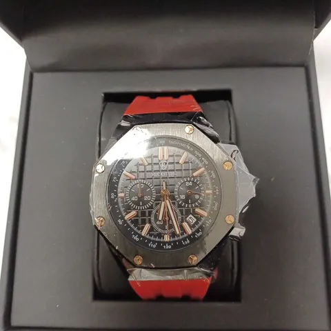 RUCKSTUHL OCTAGONAL BLACK TRIPLE DIAL STUD RED RUBBER STRAP WATCH