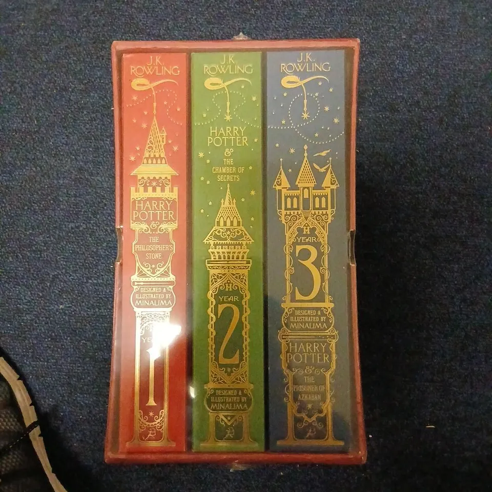 HARRY POTTER BOX SET: THE PHILOSOPHER'S STONE; THE CHAMBER OF SECRETS; THE PRISONER OF AZKABAN – MINALIMA EDITION, 3-VOLUME RED SLIPCASE