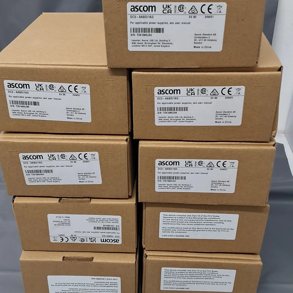 LOT OF 9 BOXED ASCOM DC3-AABD1A3 DOCKS