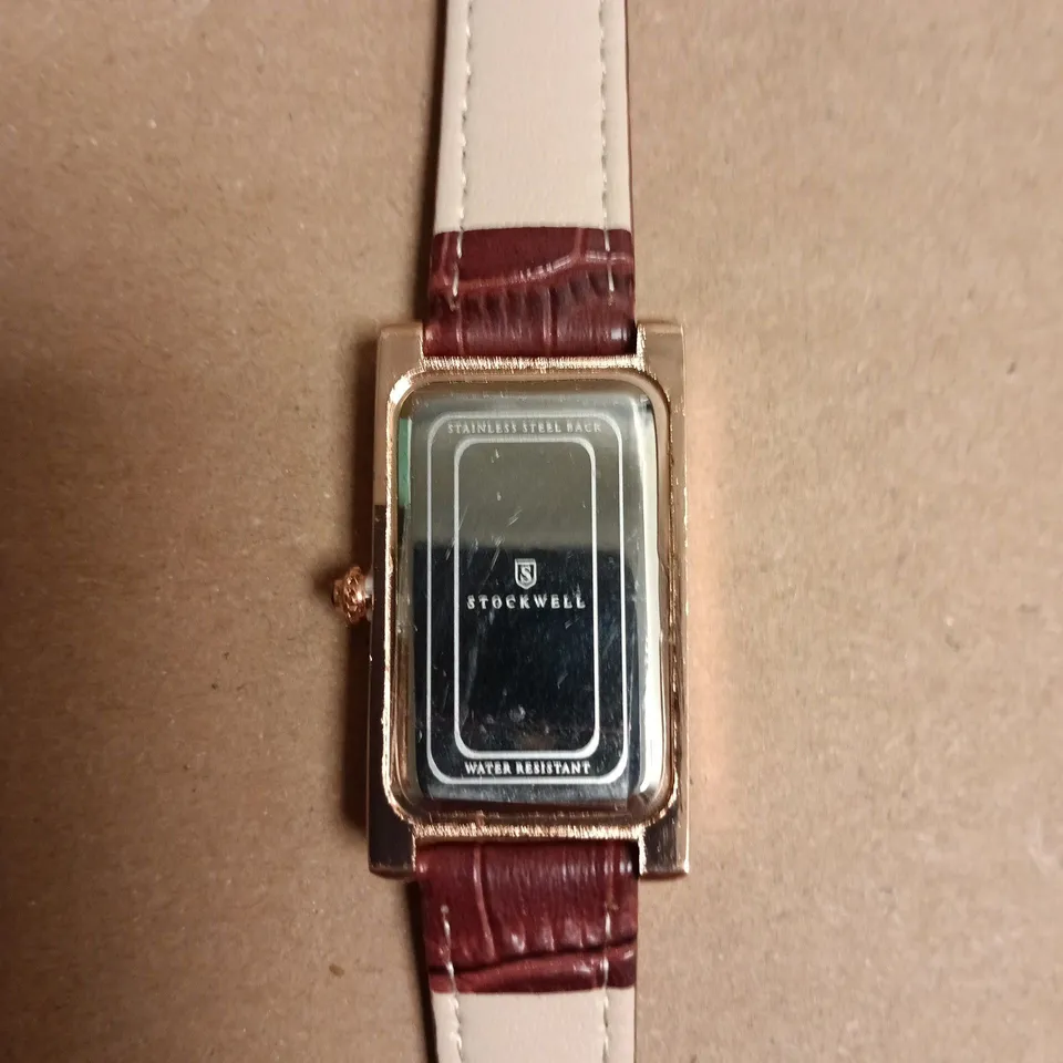 BOXED STOCKWELL RECTANGULAR GOLD-TONE WRISTWATCH WITH BURGUNDY CROCODILE-PATTERN LEATHER STRAP