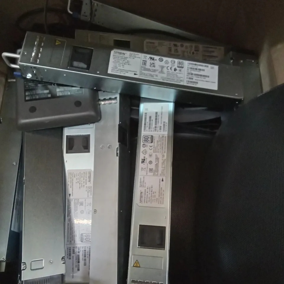 BOX OF ELECTRONICS INCLUDING CISCO UC PHONES AND ARTESYN POWER SUPPLIES