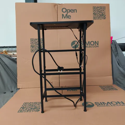BLACK DESK FRAME WITH TOP PANEL AND INTEGRATED POWER OUTLET