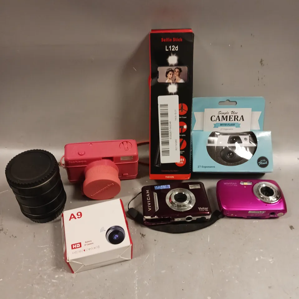 APPROXIMATELY 10 ASSORTED CAMERA PRODUCTS/ACCESSORIES TO INCLUDE DIGITAL CAMERAS, PHOTO PAPER, IP CAMERA ETC 