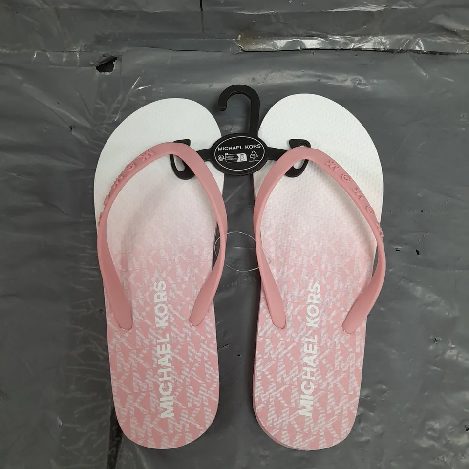 UNBOXED PAIR OF MICHAEL KORS LOGO FLIP FLOP IN PINK US MEANS 8 