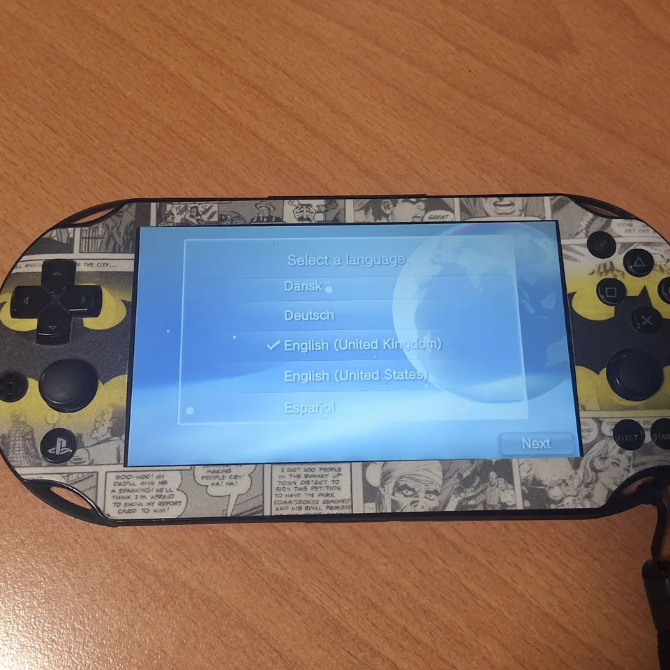 UNBOXED PSVITA BATMAN THEMED HANDHELD GAMING DEVICE