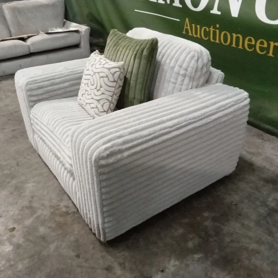 COSY FAUX FUR FABRIC ARMCHAIR RRP £849