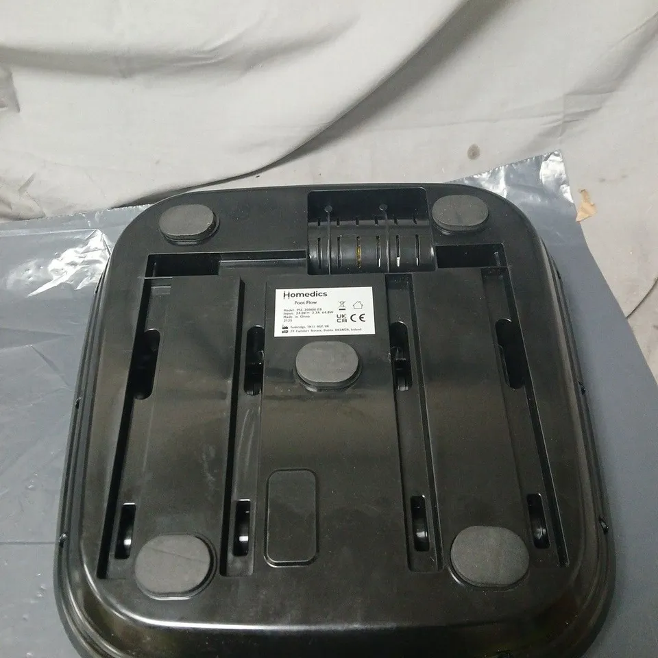 HOMEDICS FOOT FLAW DEVICE UNBOXED, NO POWER SUPPLY OR ACCESSORIES.