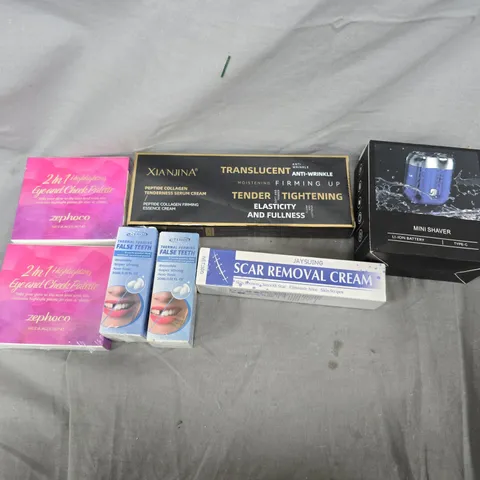 APPROXIMATELY 25 ASSORTED COSMETICS ITEMS TO INCLUDE EYE AND CHEEK PALETTE, XIANJINA PEPTIDE COLLAGEN, MINI SHAVER, ETC