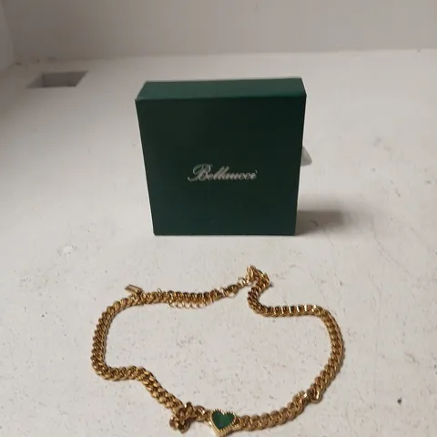 BELLAUCCI GOLD-TONE BRACELET WITH GREEN HEART PENDANT – PRESENTED IN GREEN BOX