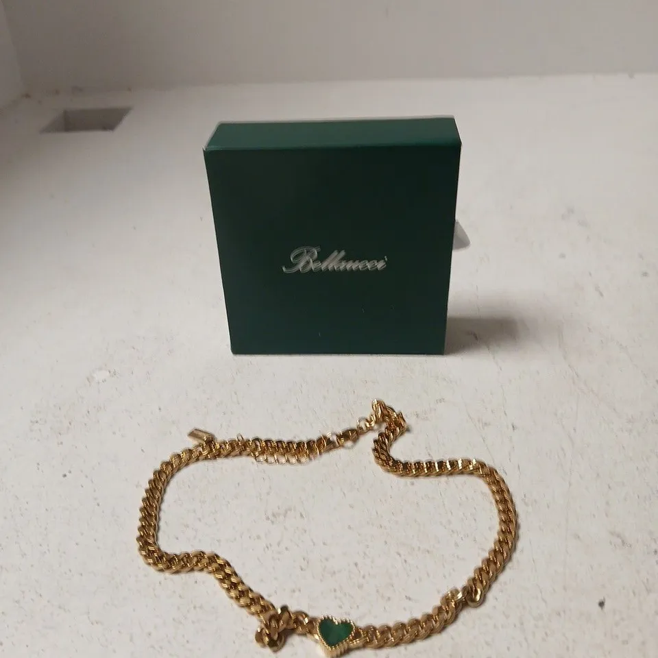 BELLAUCCI GOLD-TONE BRACELET WITH GREEN HEART PENDANT – PRESENTED IN GREEN BOX